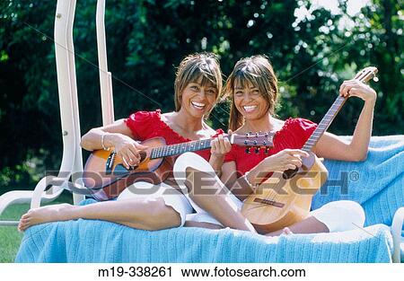 Stock Image - Columbian identical twins. Fotosearch
