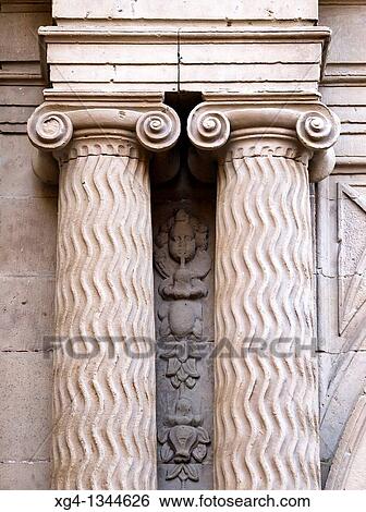 Stock Photograph - Columnas y capiteles de estilo j? nico con volutas en la portada de la iglesia de Santiago el Real - Logroo - La Rioja - Espaa. Fotosearch