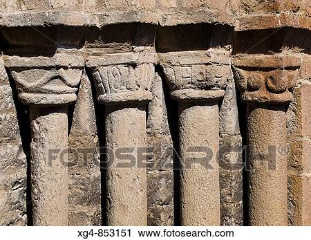 Columns and capitals on the main front of the Romanesque collegiate church of Santa Maria (12th century), Ainsa. Sobrarbe, Huesca province, Aragon, Spain View Large Photo Image Stock Image - Columns and capitals on the main front of the Romanesque collegiate church of Santa Maria (12th century), Ainsa. Sobrarbe, Huesca province, Aragon, Spain. Fotosearch