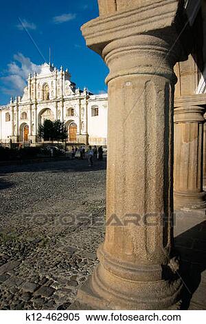 Columns from Captains Palace and Santiago's Cathedral at the background. Antigua Guatemala. Sacatep? quez department. Guatemala View Large Photo Image Stock Photography - Columns from Captains Palace and Santiago's Cathedral at the background. Antigua Guatemala. Sacatep? quez department. Guatemala. Fotosearch