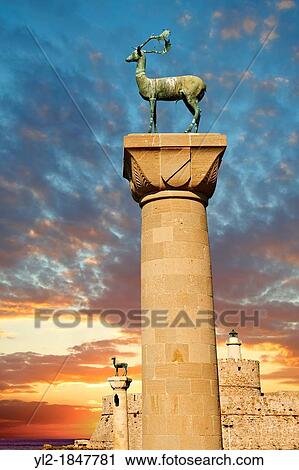 Columns with deer at the entrance to Madraki, the archaic naval docks Rhodes, Greece UNESCO World Heritage Site View Large Photo Image Stock Image - Columns with deer at the entrance to Madraki, the archaic naval docks Rhodes, Greece UNESCO World Heritage Site. Fotosearch