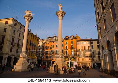 Stock Image - Columns with Lion of St Mark and Redeemer on top of them Piazza dei Signori square Vicenza the Veneto region northern Italy Europe. Fotosearch