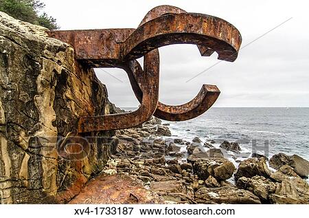 Comb of the wind, sculpture by Eduardo Chillida San Sebastian, Gipuzkoa, Basque Country, Spain Europe View Large Photo Image Stock Photo - Comb of the wind, sculpture by Eduardo Chillida San Sebastian, Gipuzkoa, Basque Country, Spain Europe. Fotosearch
