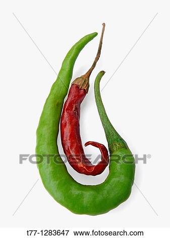 Common Chili, Capsicum annuum, Red and green chilies are together View Large Photo Image Stock Photo - Common Chili, Capsicum annuum, Red and green chilies are together. Fotosearch