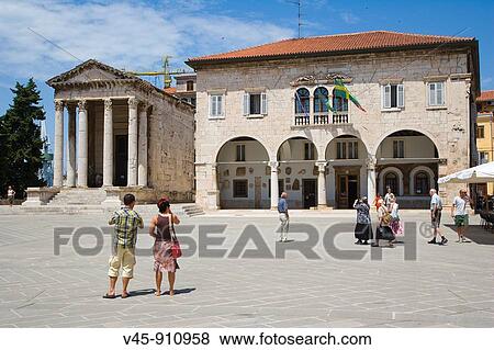 Communal Palace, City hall and Temple of Augustus (Augustov hram), Forum Square, Pula, Istria, Croatia View Large Photo Image Stock Photo - Communal Palace, City hall and Temple of Augustus (Augustov hram), Forum Square, Pula, Istria, Croatia. Fotosearch
