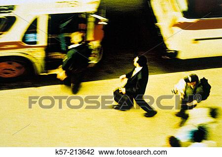 Commuters getting on bus View Large Photo Image Stock Image - Commuters getting on bus. Fotosearch