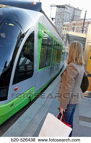Commuters. Tramway. Bilbao, Bizkaia, Euskadi. Spain. View Large Photo Image Stock Photo - Commuters. Tramway. Bilbao, Bizkaia, Euskadi. Spain.. Fotosearch