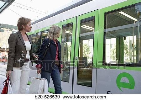 Commuters. Tramway. Bilbao, Bizkaia, Euskadi. Spain. View Large Photo Image Stock Photo - Commuters. Tramway. Bilbao, Bizkaia, Euskadi. Spain.. Fotosearch