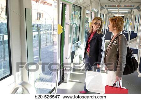 Commuters. Tramway. Bilbao, Bizkaia, Euskadi. Spain. View Large Photo Image Stock Photo - Commuters. Tramway. Bilbao, Bizkaia, Euskadi. Spain.. Fotosearch