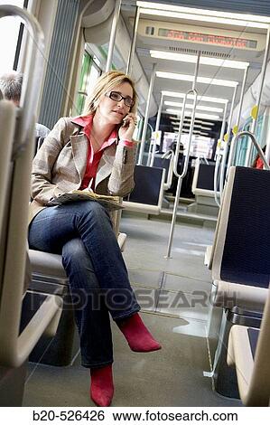 Commuters. Tramway. Bilbao, Bizkaia, Euskadi. Spain. View Large Photo Image Stock Photograph - Commuters. Tramway. Bilbao, Bizkaia, Euskadi. Spain.. Fotosearch
