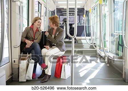 Commuters. Tramway. Bilbao, Bizkaia, Euskadi. Spain. View Large Photo Image Stock Photograph - Commuters. Tramway. Bilbao, Bizkaia, Euskadi. Spain.. Fotosearch