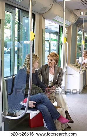 Commuters. Tramway. Bilbao, Bizkaia, Euskadi. Spain. View Large Photo Image Stock Photograph - Commuters. Tramway. Bilbao, Bizkaia, Euskadi. Spain.. Fotosearch
