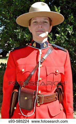Comox Nautical Days Parade. A young female Royal officer in uniform. BC, Canada View Large Photo Image Picture - Comox Nautical Days Parade. A young female Royal officer in uniform. BC, Canada. Fotosearch