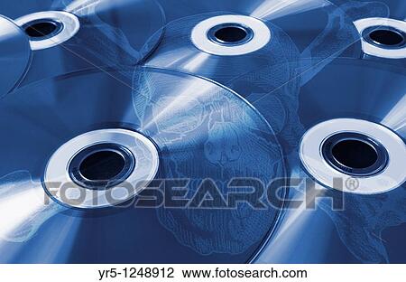 Stock Image - Compact discs with skull and crossbones overlayed Concept image depicting pirate CD? s. Fotosearch