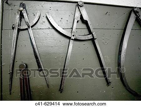 Compasses and other measurement tools View Large Photo Image Picture - Compasses and other measurement tools. Fotosearch