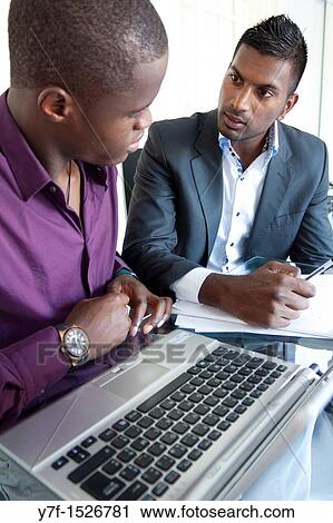 Computing teacher and his young student View Large Photo Image Stock Image - Computing teacher and his young student. Fotosearch