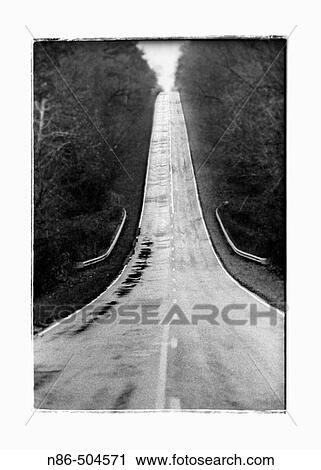 Conceptual long shot of a highway View Large Photo Image Stock Image - Conceptual long shot of a highway. Fotosearch