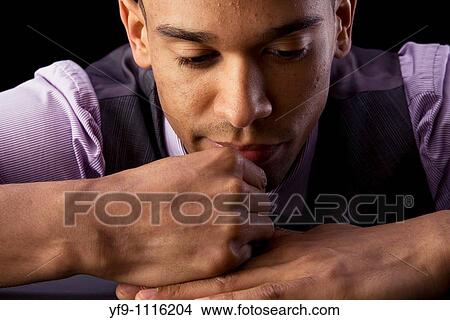 Concerned young businessman. View Large Photo Image Picture - Concerned young businessman.. Fotosearch