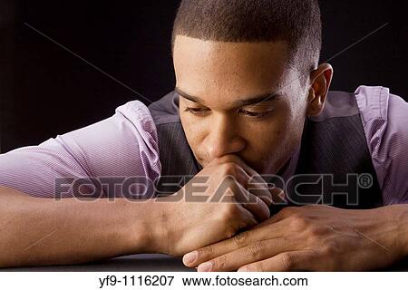 Concerned young businessman. View Large Photo Image Stock Photo - Concerned young businessman.. Fotosearch