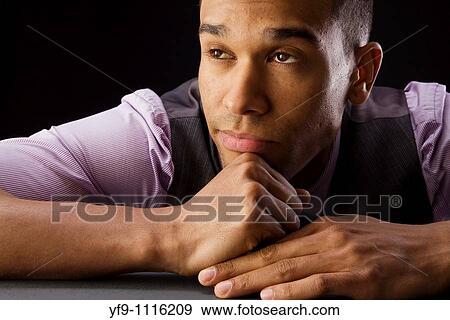 Concerned young businessman. View Large Photo Image Stock Photo - Concerned young businessman.. Fotosearch