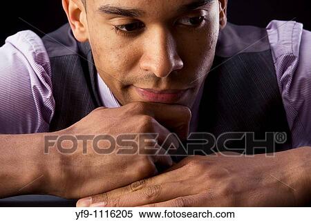 Concerned young businessman. View Large Photo Image Stock Photography - Concerned young businessman.. Fotosearch