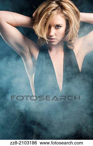 Confident young woman. View Large Photo Image Stock Photograph - Confident young woman.. Fotosearch