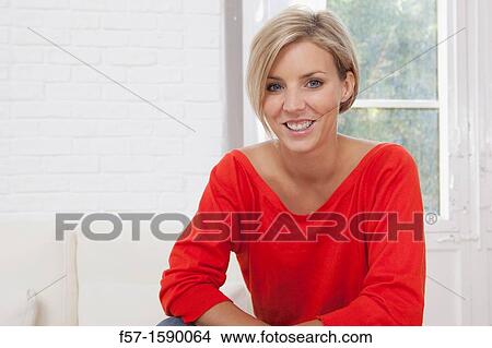 Confident young women at home View Large Photo Image Picture - Confident young women at home. Fotosearch