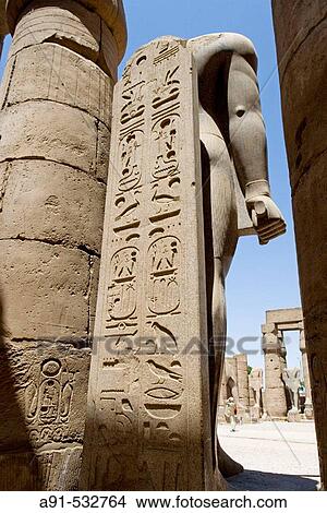 Consecrated to God Amon-Re the Luxor temple was built by Amenophis III (1391-1353), elarged later on mostly by Ramasses II (1279-1213). The temple was linked to Karnak by a 3km alley lined with sphinxes. Luxor. Egypt View Large Photo Image Picture - Consecrated to God Amon-Re the Luxor temple was built by Amenophis III (1391-1353), elarged later on mostly by Ramasses II (1279-1213). The temple was linked to Karnak by a 3km alley lined with sphinxes. Luxor. Egypt. Fotosearch