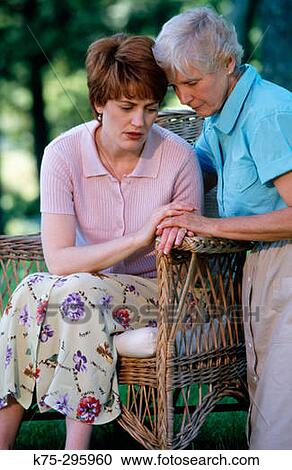 Stock Image - consoling each other. Fotosearch