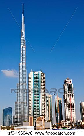 Construction and new skyline of amazing Dubai UAE with the world's tallest building Burj Khalifa at 2722 feet and 162 stories in thriving new United Arab Emirates in Middle East in Gulf States. View Large Photo Image Stock Photo - Construction and new skyline of amazing Dubai UAE with the world's tallest building Burj Khalifa at 2722 feet and 162 stories in thriving new United Arab Emirates in Middle East in Gulf States.. Fotosearch