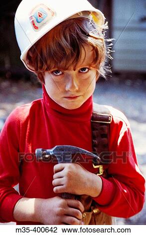 Construction boy with hammer View Large Photo Image Stock Image - Construction boy with hammer. Fotosearch