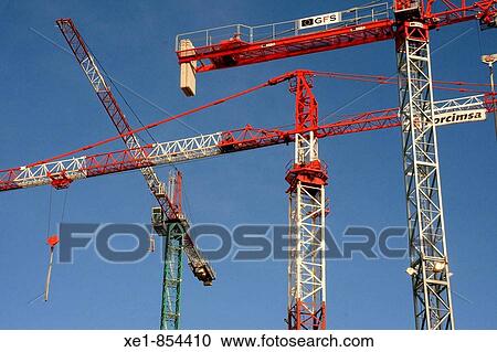 Construction cranes View Large Photo Image Stock Image - Construction cranes. Fotosearch