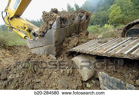 Construction of forest trail with black slag from foundry. Ormaiztegi, Guipzcoa. Euskadi, Spain View Large Photo Image Stock Image - Construction of forest trail with black slag from foundry. Ormaiztegi, Guipzcoa. Euskadi, Spain. Fotosearch