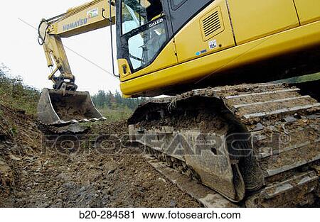 Stock Image - Construction of forest trail with black slag from foundry. Ormaiztegi, Guipzcoa. Euskadi, Spain. Fotosearch