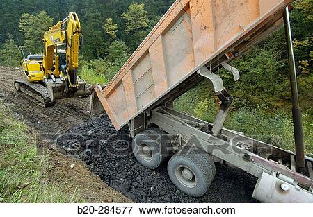 Construction of forest trail with black slag from foundry. Ormaiztegi, Guipzcoa. Euskadi, Spain View Large Photo Image Stock Photo - Construction of forest trail with black slag from foundry. Ormaiztegi, Guipzcoa. Euskadi, Spain. Fotosearch