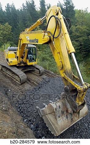 Construction of forest trail with black slag from foundry. Ormaiztegi, Guipzcoa. Euskadi, Spain View Large Photo Image Stock Photo - Construction of forest trail with black slag from foundry. Ormaiztegi, Guipzcoa. Euskadi, Spain. Fotosearch