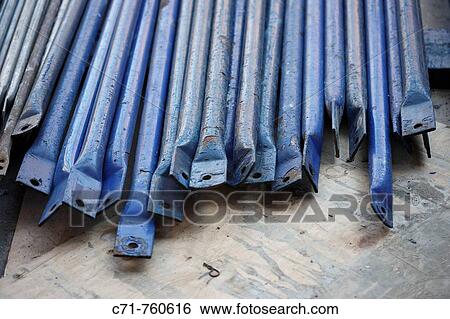 Construction scaffolding blue poles View Large Photo Image Stock Photograph - Construction scaffolding blue poles. Fotosearch