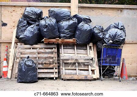 Construction site garbage piled up View Large Photo Image Stock Image - Construction site garbage piled up. Fotosearch