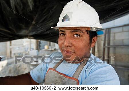 Stock Image - Construction site worker. Fotosearch