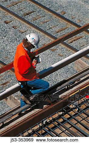 Stock Photo - Construction supervisor with electronic notepad. I-880 Cypress project. Oakland, California. USA.. Fotosearch