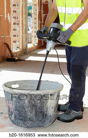 Construction worker making mortar with mixer, Building machinery, Donostia, San Sebastian, Gipuzkoa, Basque Country, Spain View Large Photo Image Stock Image - Construction worker making mortar with mixer, Building machinery, Donostia, San Sebastian, Gipuzkoa, Basque Country, Spain. Fotosearch