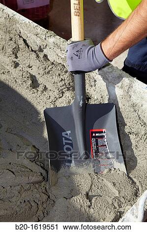 Construction worker making with a shovel by mortar, Building hand tool, Donostia, San Sebastian, Gipuzkoa, Basque Country, Spain View Large Photo Image Stock Image - Construction worker making with a shovel by mortar, Building hand tool, Donostia, San Sebastian, Gipuzkoa, Basque Country, Spain. Fotosearch
