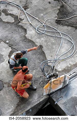 Construction worker on a highway construction site View Large Photo Image Stock Image - Construction worker on a highway construction site. Fotosearch