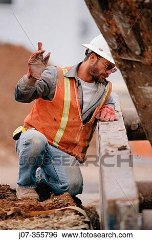 Construction worker. Texas. USA. View Large Photo Image Stock Photograph - Construction worker. Texas. USA.. Fotosearch