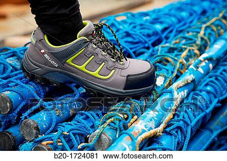 Construction worker with safety boots equipped, House Construction, Basque Country, Spain View Large Photo Image Stock Image - Construction worker with safety boots equipped, House Construction, Basque Country, Spain. Fotosearch