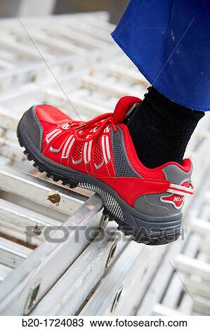 Construction worker with safety boots equipped, House Construction, Basque Country, Spain View Large Photo Image Stock Image - Construction worker with safety boots equipped, House Construction, Basque Country, Spain. Fotosearch
