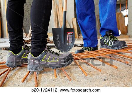 Construction worker with safety boots equipped, House Construction, Basque Country, Spain View Large Photo Image Stock Image - Construction worker with safety boots equipped, House Construction, Basque Country, Spain. Fotosearch