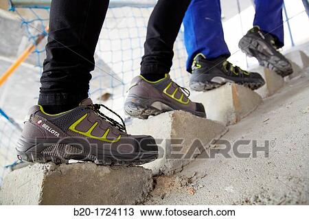 Construction worker with safety boots equipped, House Construction, Basque Country, Spain View Large Photo Image Stock Image - Construction worker with safety boots equipped, House Construction, Basque Country, Spain. Fotosearch
