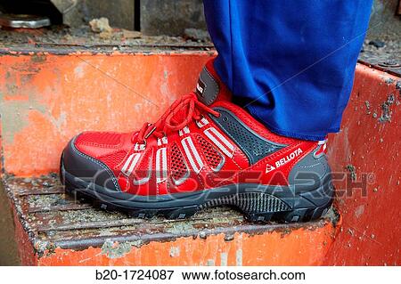 Construction worker with safety boots equipped, House Construction, Basque Country, Spain View Large Photo Image Stock Photo - Construction worker with safety boots equipped, House Construction, Basque Country, Spain. Fotosearch