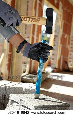 Construction worker with sledgehammer and chisel, Building hand tool, Donostia, San Sebastian, Gipuzkoa, Basque Country, Spain View Large Photo Image Stock Image - Construction worker with sledgehammer and chisel, Building hand tool, Donostia, San Sebastian, Gipuzkoa, Basque Country, Spain. Fotosearch